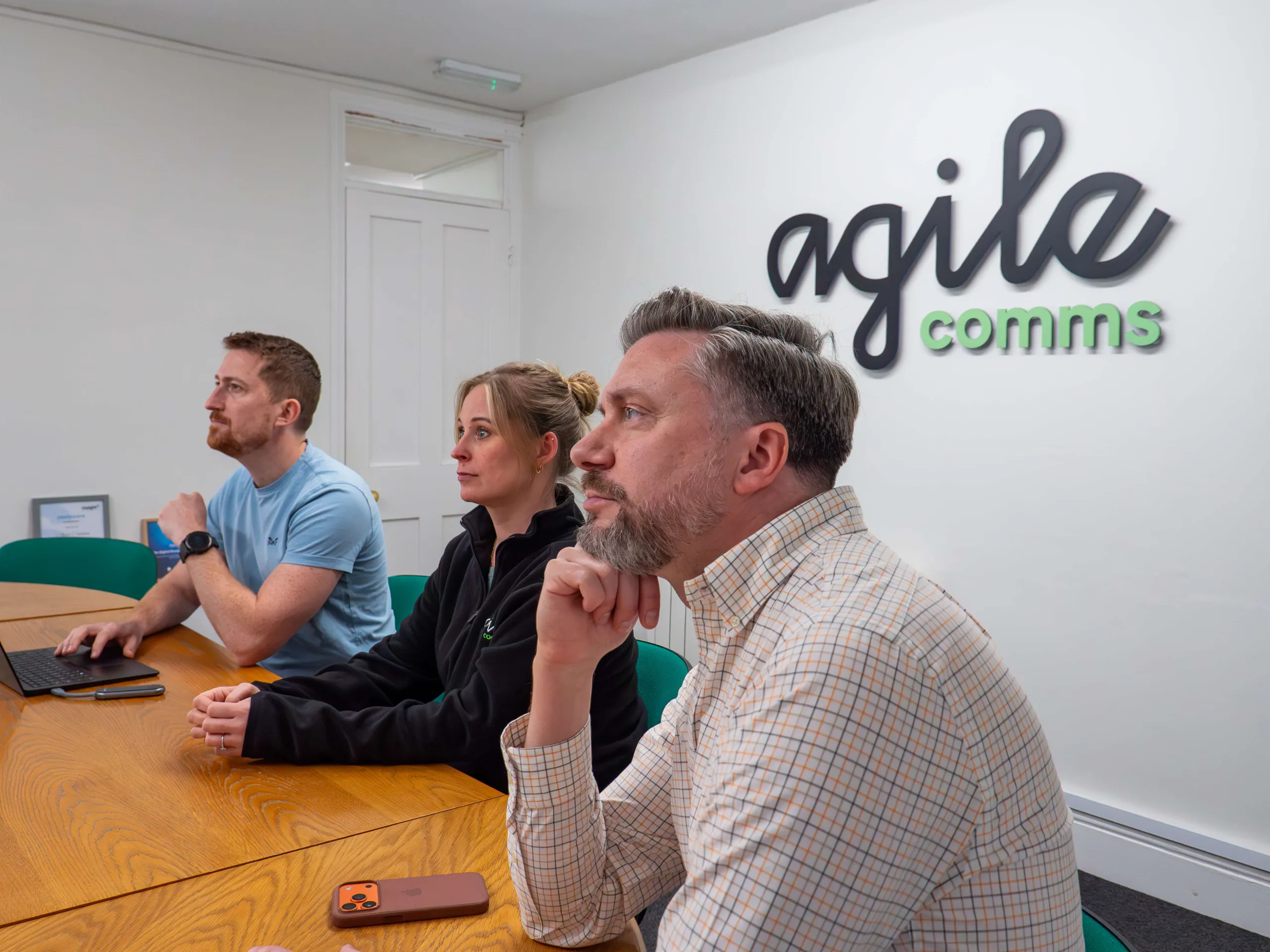 James, Aimee and Ollie in an internal meeting