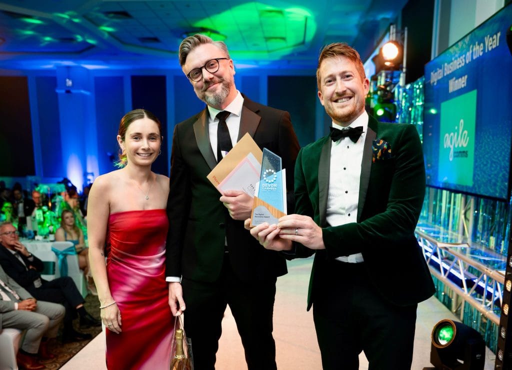 Ollie and James collecting the award,